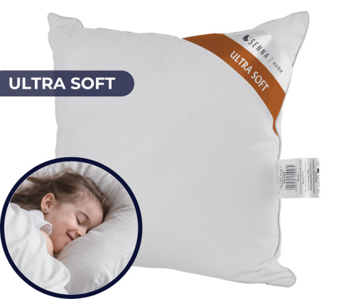 poduszka antyalergiczna w kolorze białym zbliżnie na śpiące dziecko